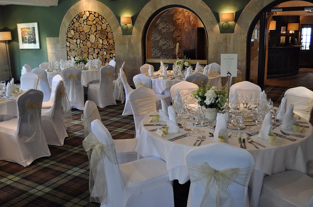 Bear of Rodborough wedding with chair covers Stroud