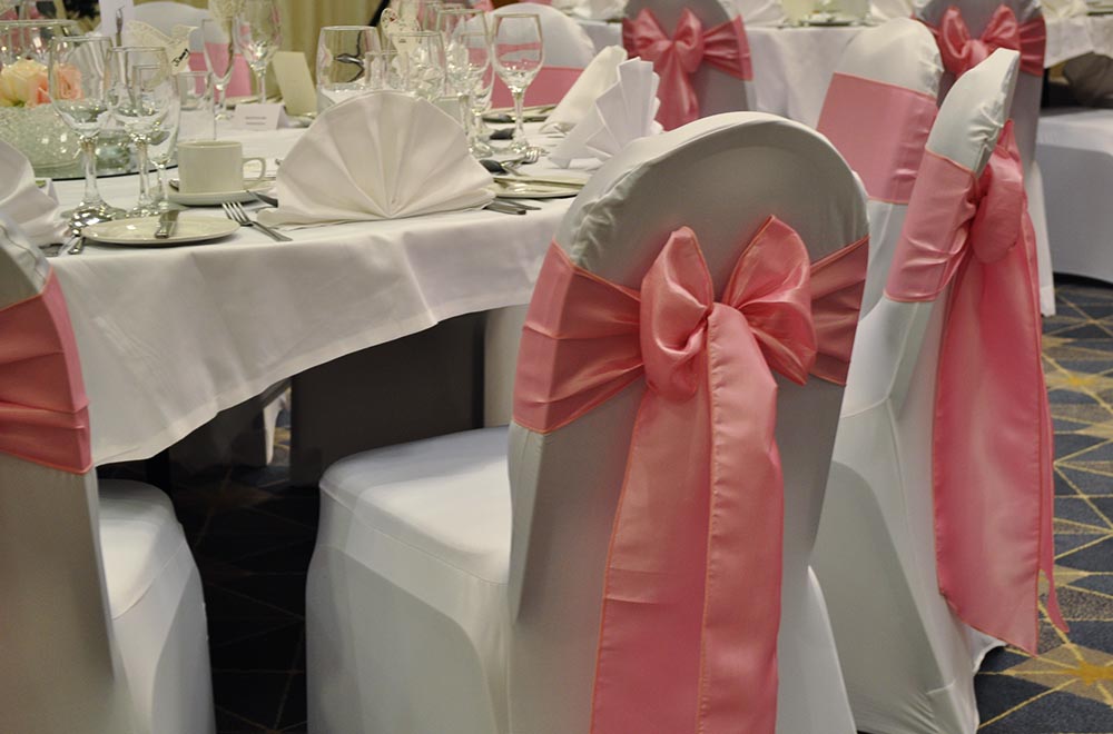 Pink Taffeta chair sashes for a wedding at Alexandra House Conference Centre Swindon
