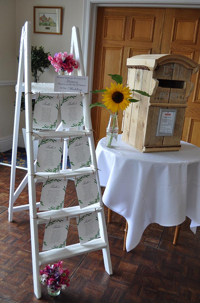 Post box and decorated ladder for table plan marsh Farm Hotel Swindon Wedding