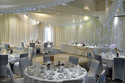 Lilac wedding with room drapery at Alexandra House Hotel and Conference Centre