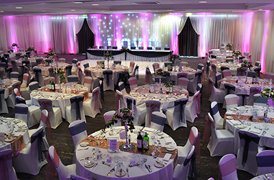 Navy and Rose Gold themed wedding, with full room drapery, lighting and centrepieces, at the Doubletree by Hilton Swindon