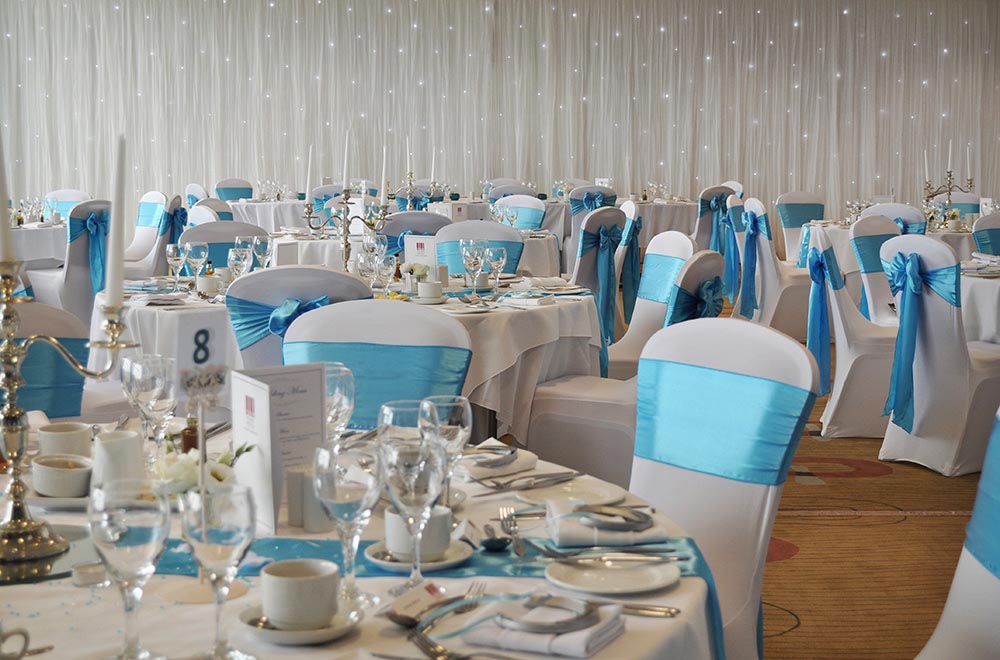 Turquoise Chair Sashes in Satin at Cotswold Waterpark Hotel